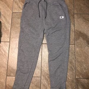 Gray woman’s Nike sweatpants